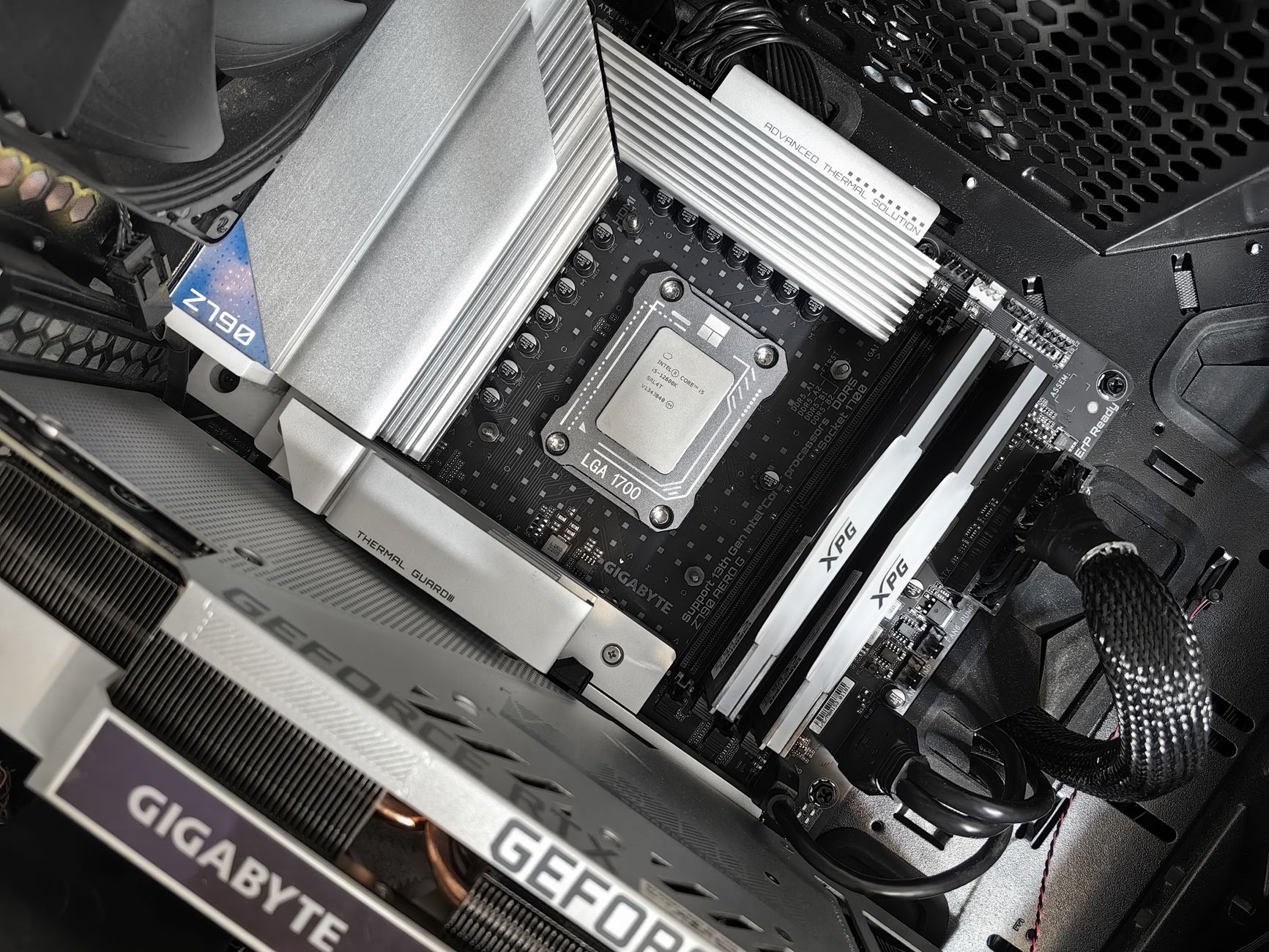 A motherboard and memory fitted inside a case